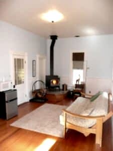 living room with wood stove and seating