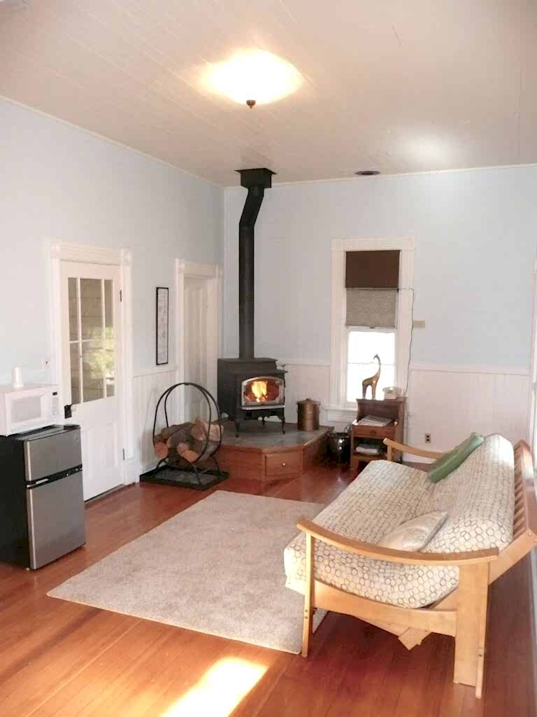 living room with wood stove and seating