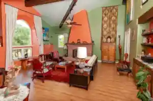living area with fireplace and couches