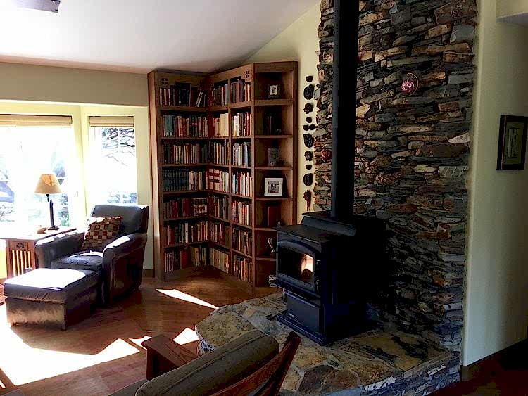living room with wood stove