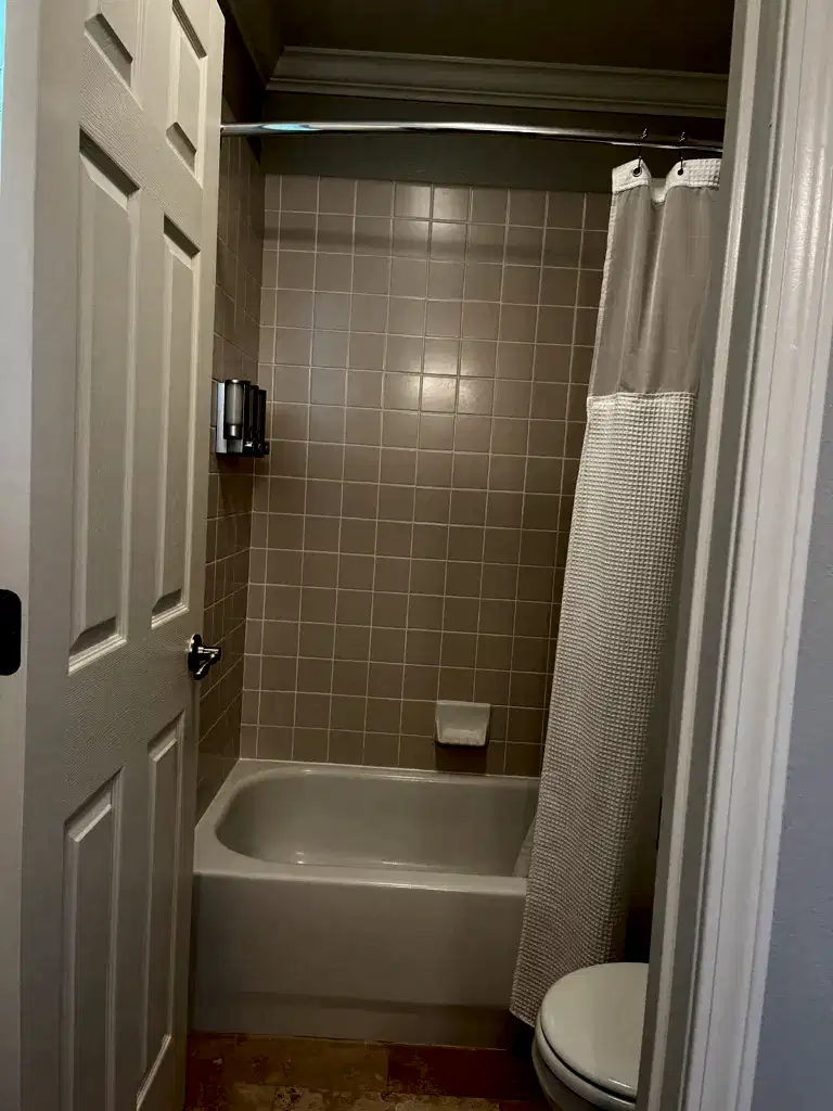 bathroom with tub shower